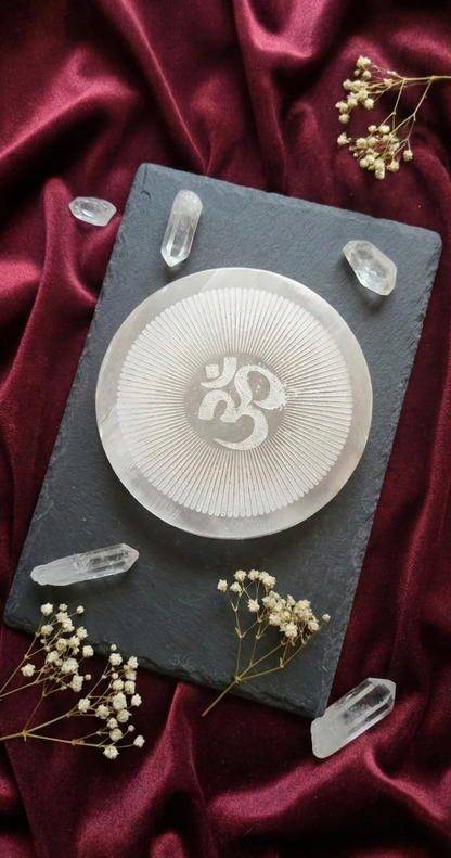 Om Engraved Selenite Charging Plate.